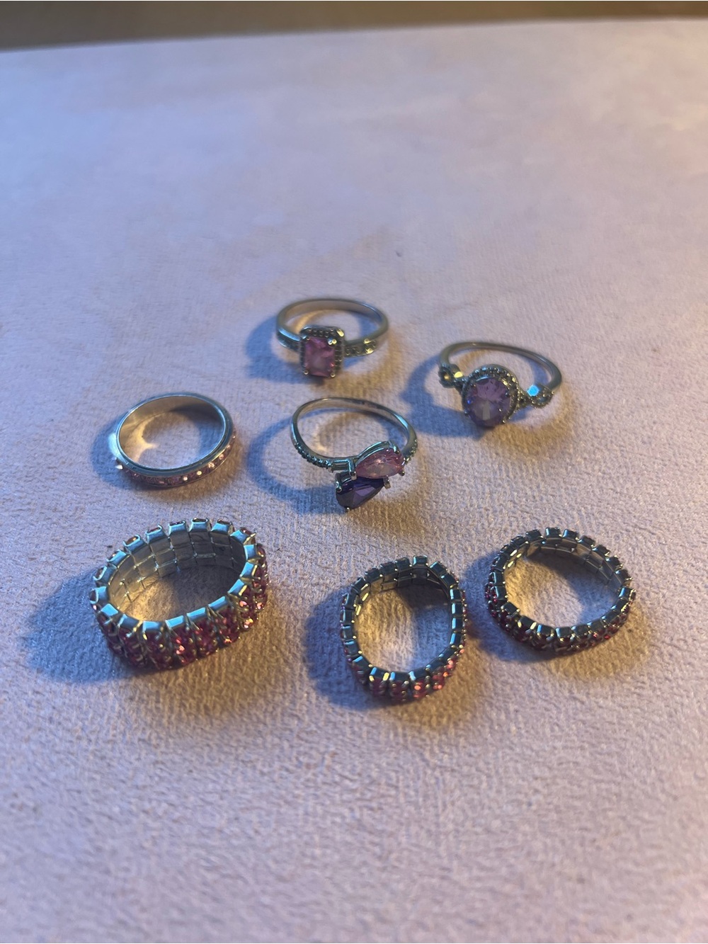 Bundle of Seven Silver Tone Pink and Purple Costume Jewelry Rings
